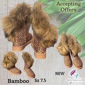 Bamboo NEW - Sz 7.5 - faux fur trim asymmetric shaft - outside is lower trimmed